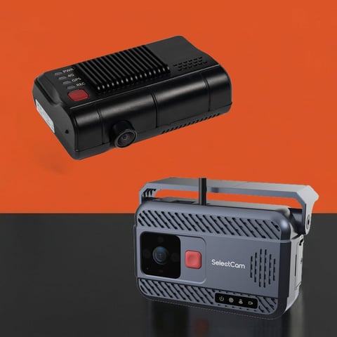 Two compact car dash cameras displayed against an orange and black background
